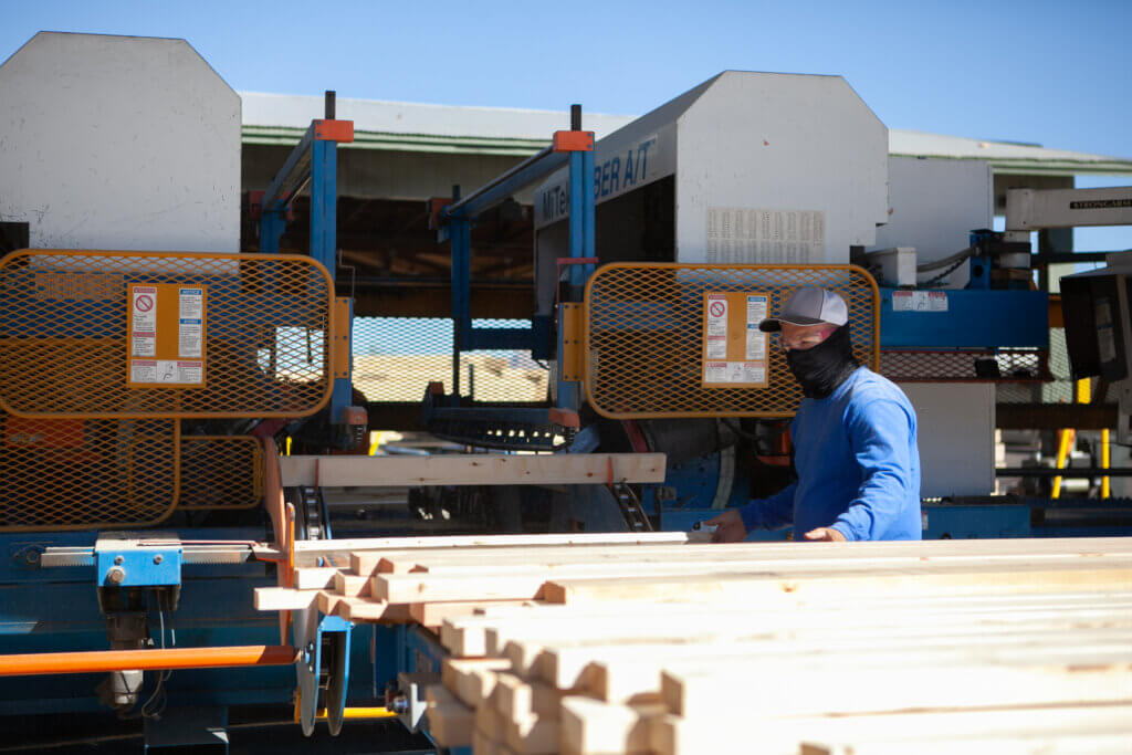 Custom wooden trusses being manufactured